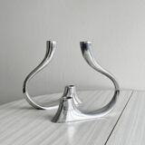 Pair of designer candlesticks in chromed metal