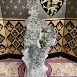 Stone garden statue to the child