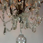 Bronze cage chandelier adorned with crystal drops, circa 1880