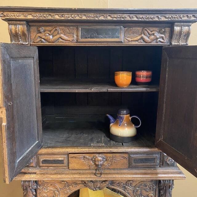 Antique carved wooden jam cupboard, two-part piece of furniture