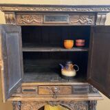 Antique carved wooden jam cupboard, two-part piece of furniture