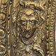 A. Arens, Antwerp, important oval mirror in repoussé brass with numerous animal decorations