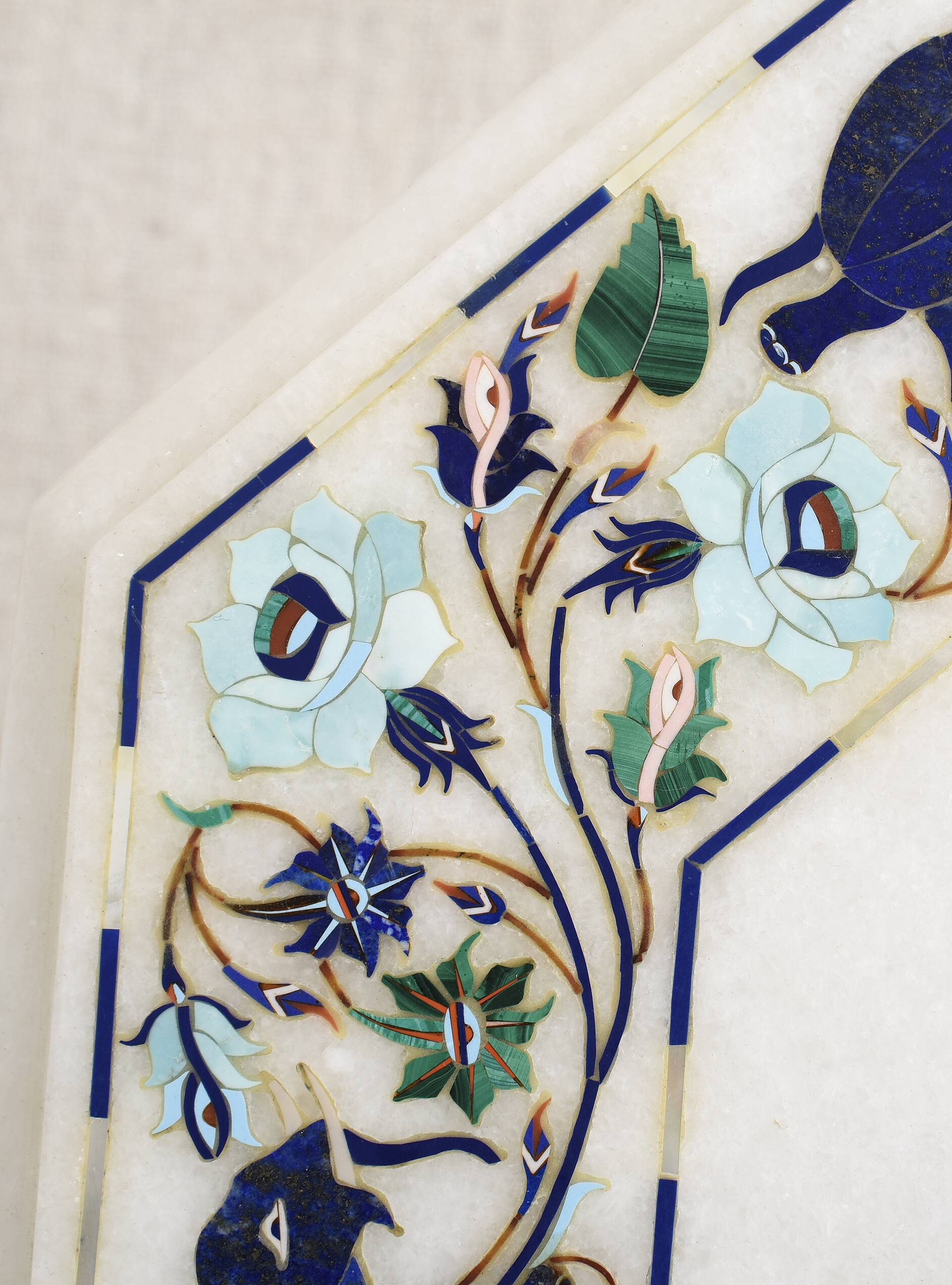 Side table with marble top and inlaid stones