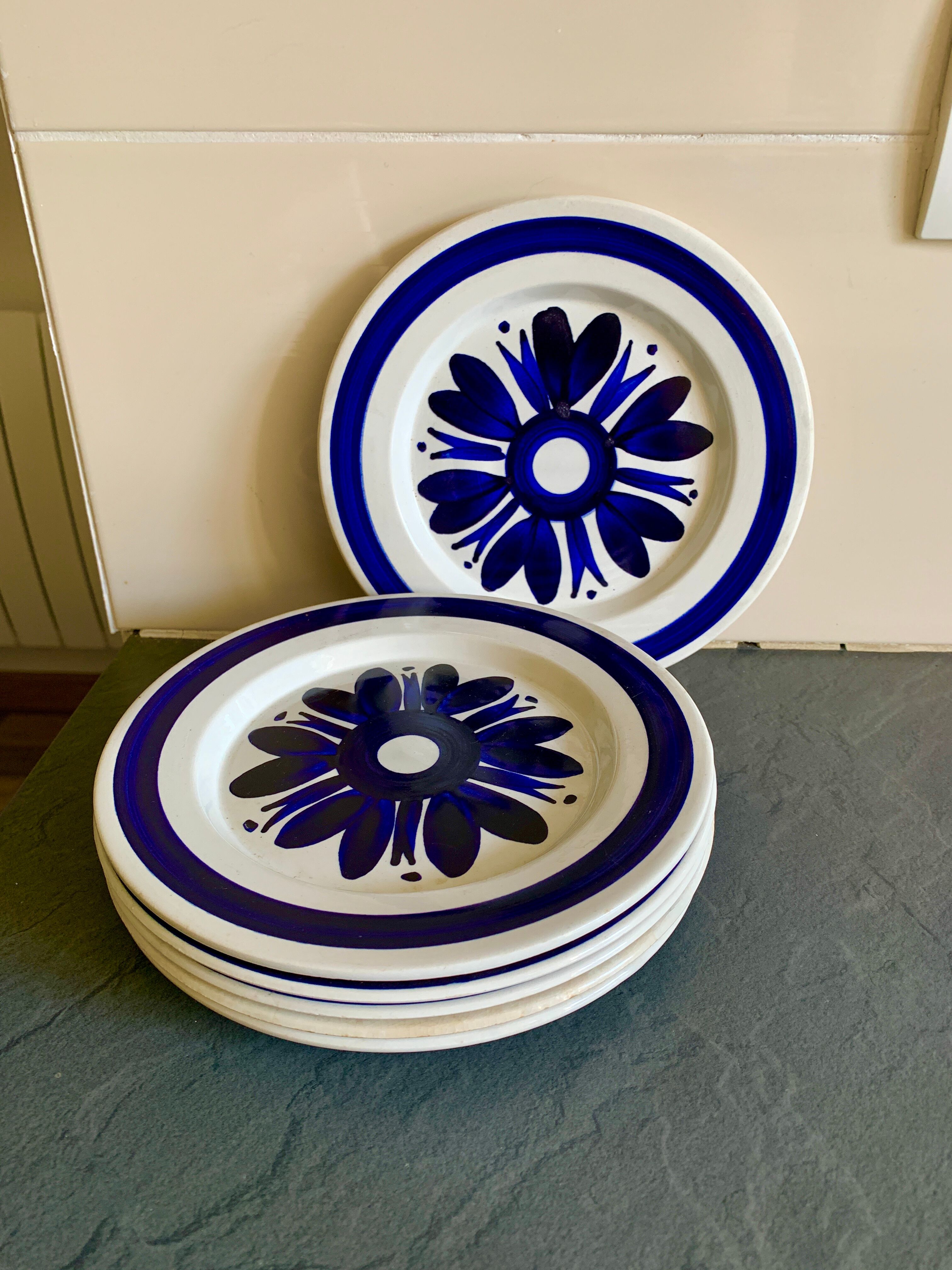 6 white vintage plates with blue flowers