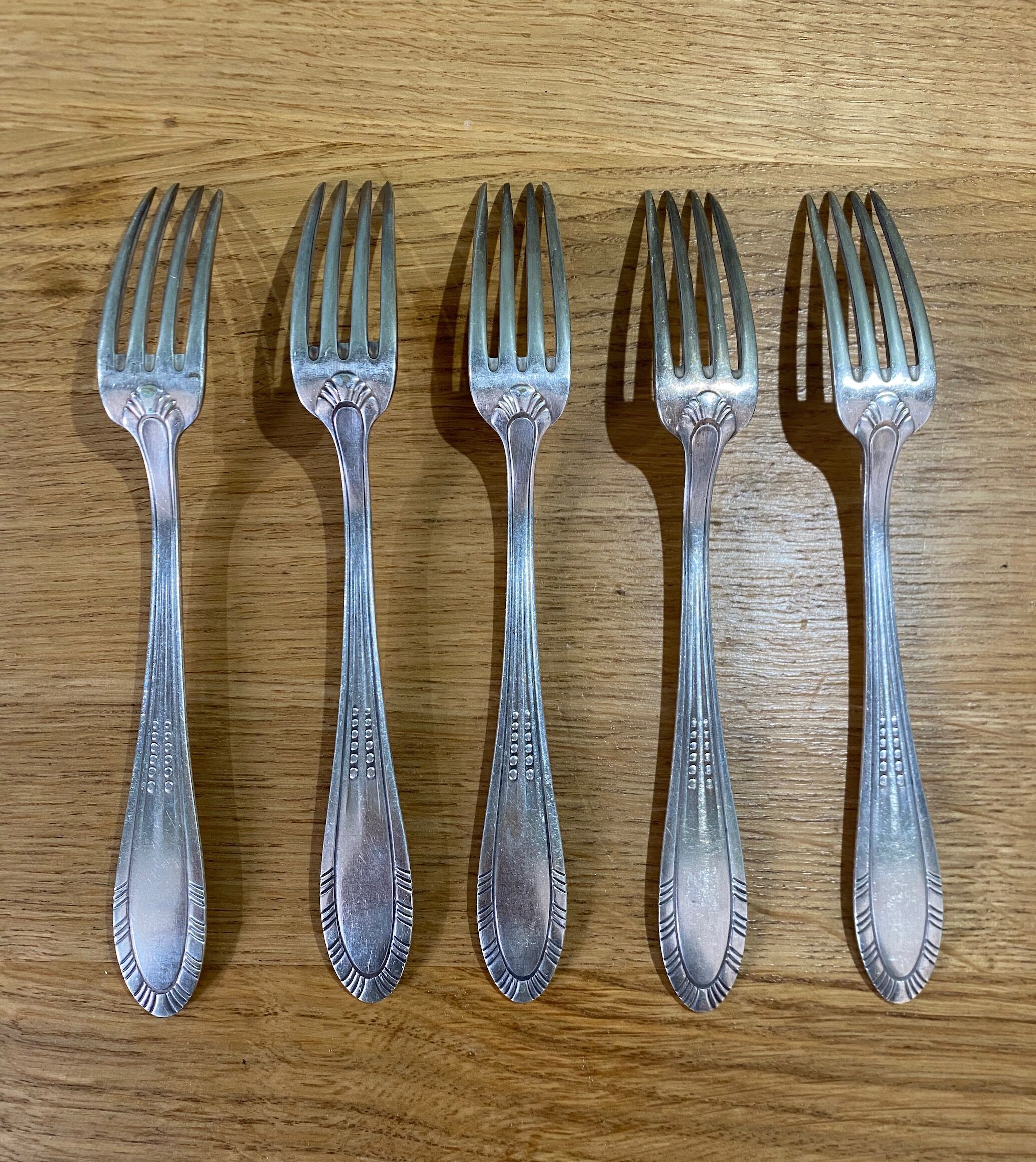 5 antique forks in silver metal