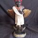 Centerpiece with African characters, plaster, resin and wood