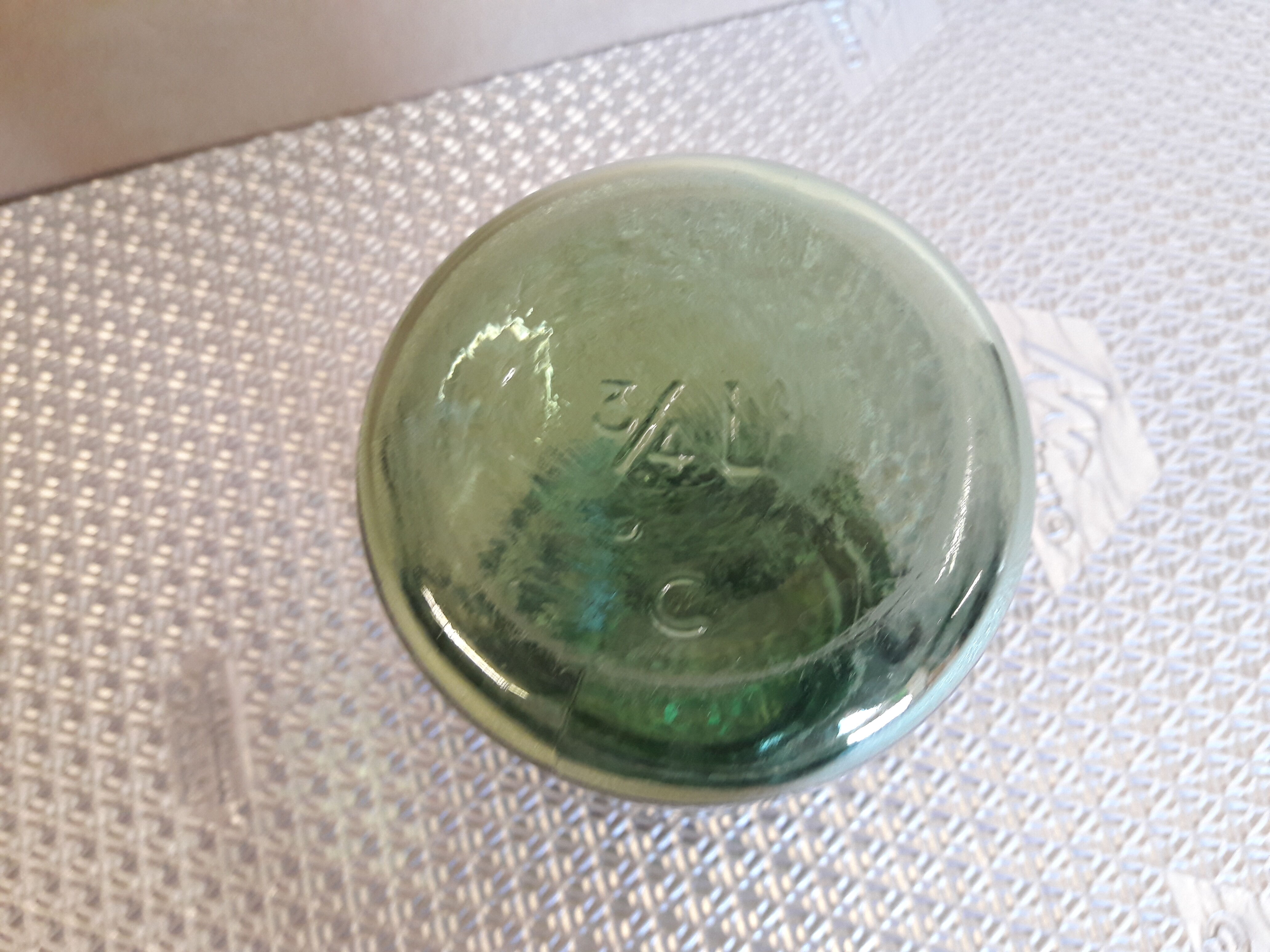 Green glass jar l l 'ideal