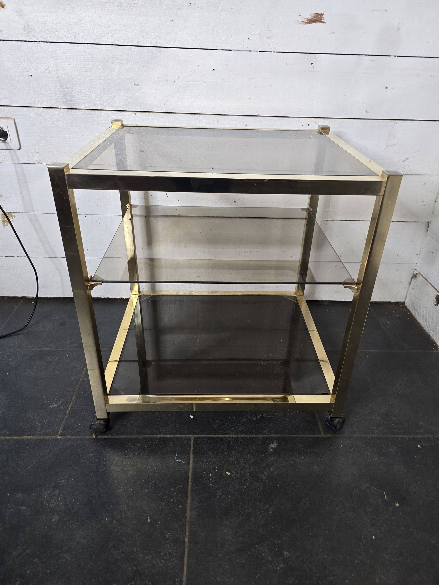 Brass and smoked glass side table from the 70s
