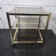 Brass and smoked glass side table from the 70s