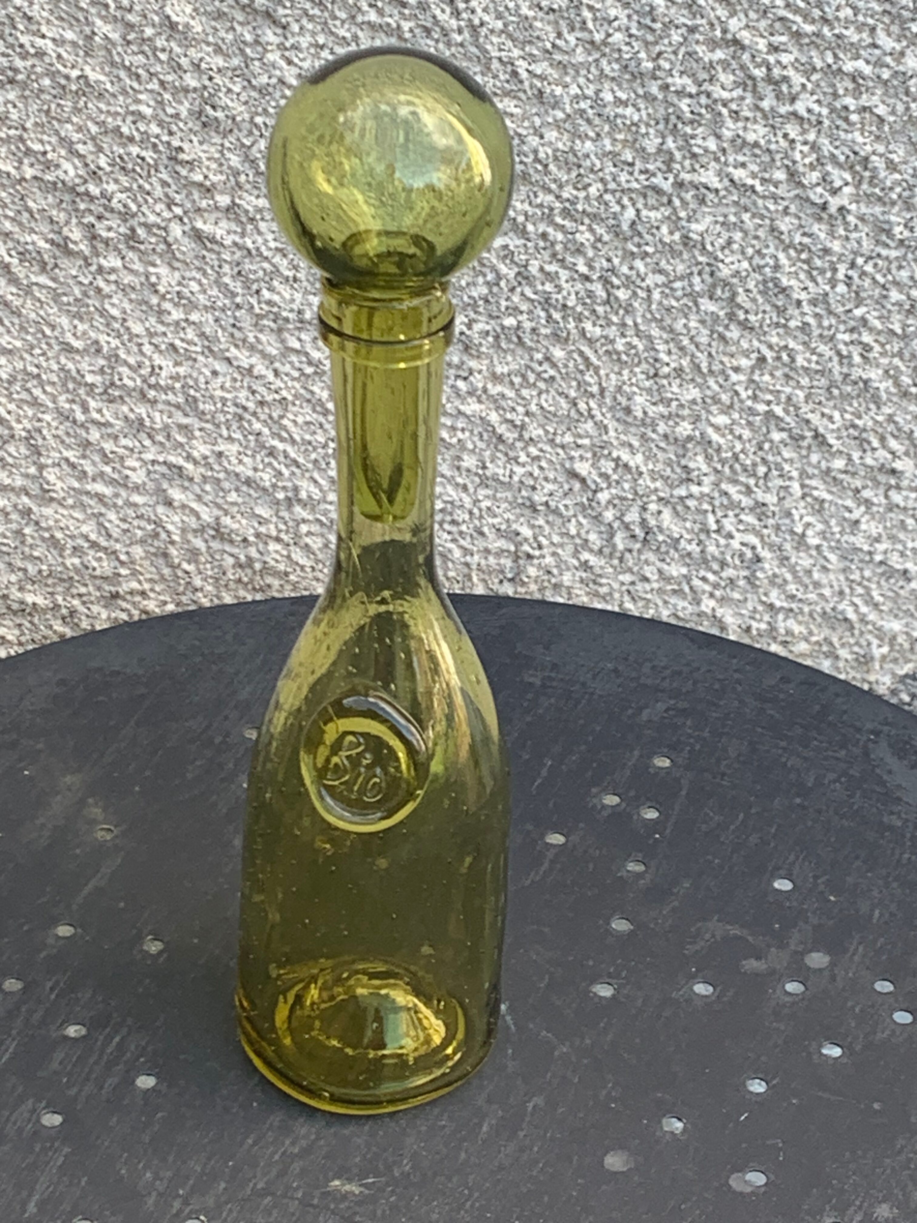 Glassblown glass decanter from the Biot collector glassworks