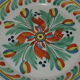 Floral earthenware plate to identify Nevers Desvres East Centre