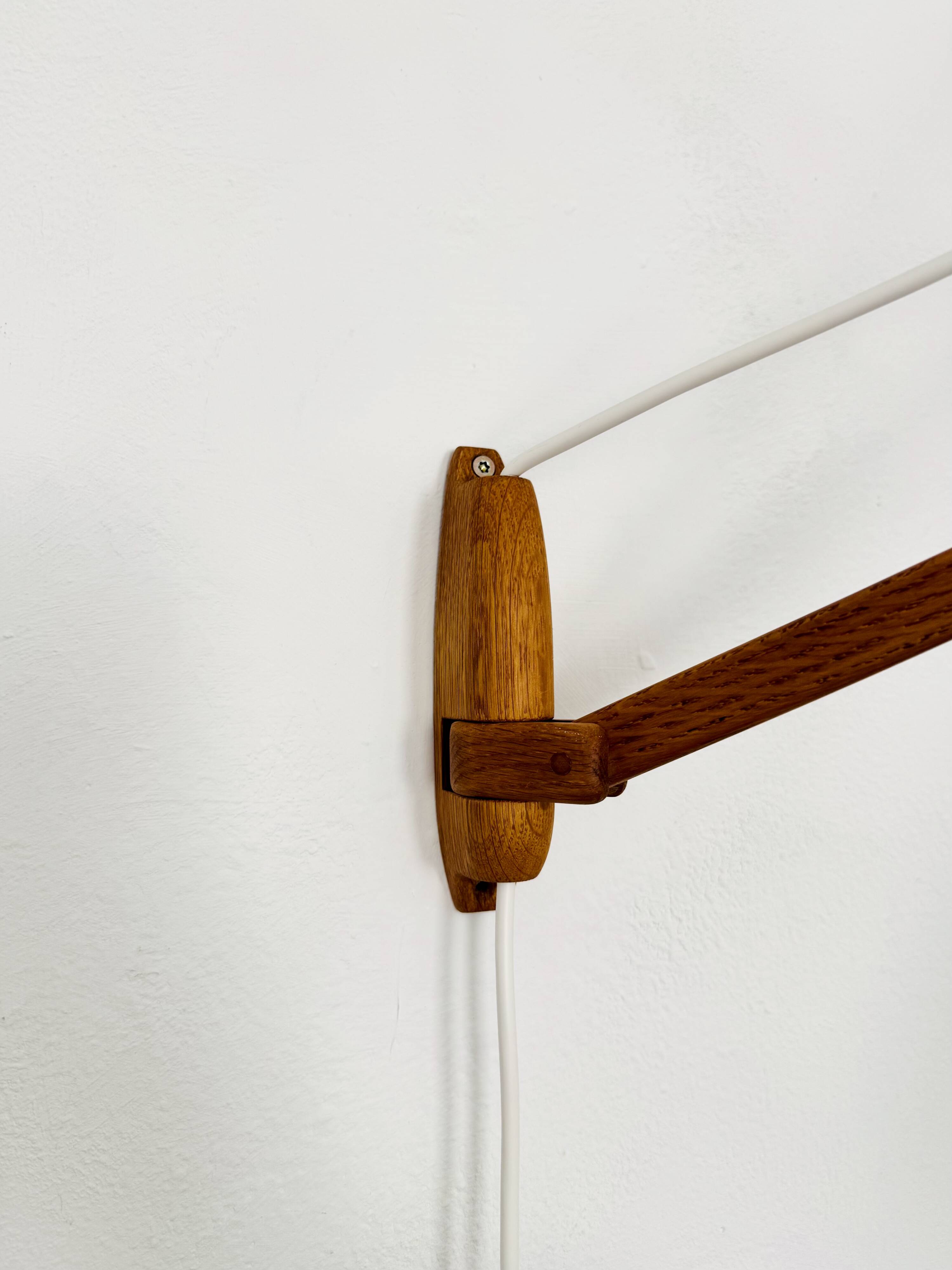 Danish Adjustable Oak Wall Lamp by Uno and Östen Kristiansson