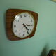 Formica wall clock with day and date - 1970s