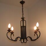 Green iron 4 light chandelier with scrolled arms