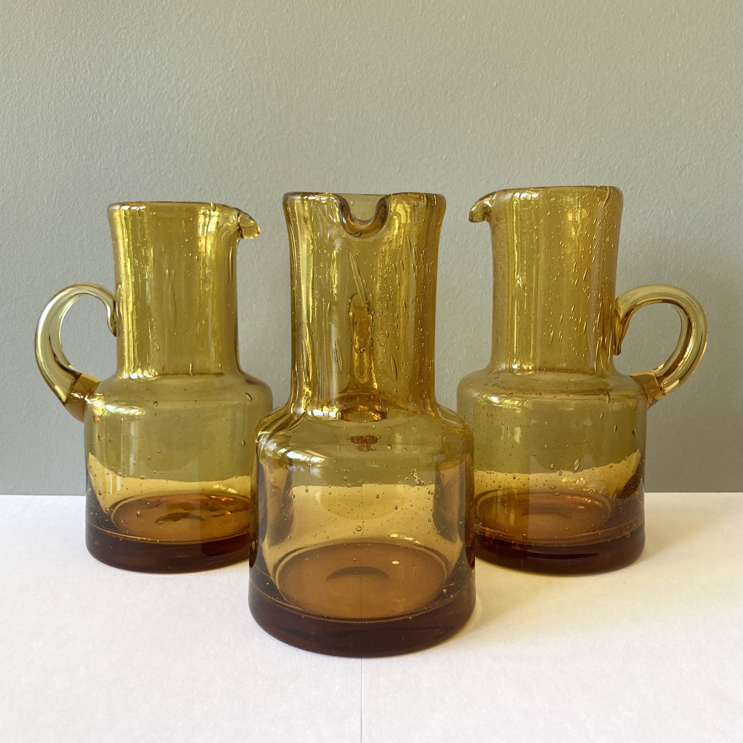 Vintage pitcher or jug forming a vase in amber and bubbled glass in the style of Biot glassware