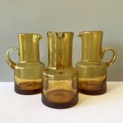 Vintage pitcher or jug forming a vase in amber and bubbled glass in the style of Biot glassware