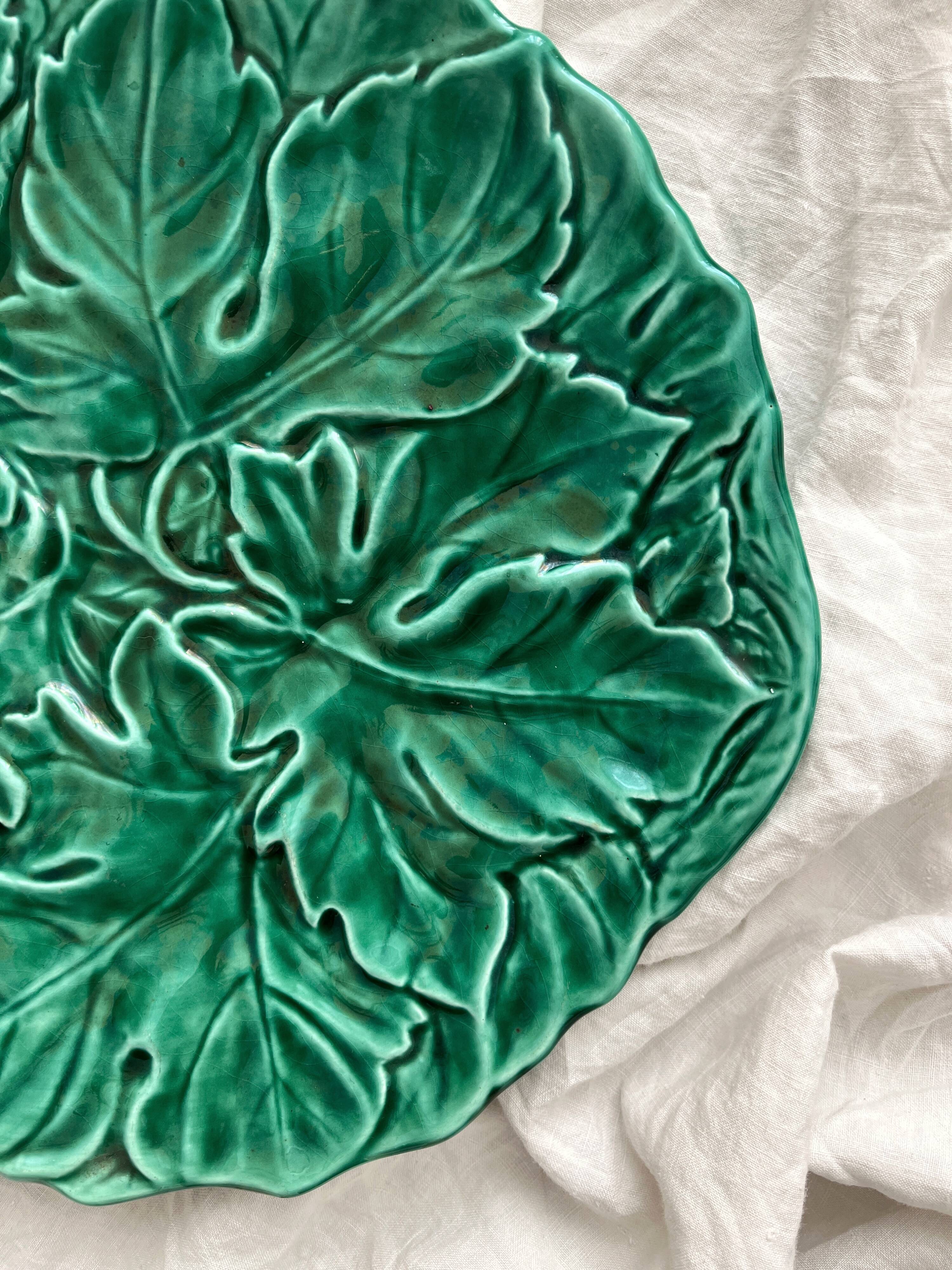 Round barbotine dish decorated with green leaves, Digoin vintage