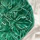 Round barbotine dish decorated with green leaves, Digoin vintage