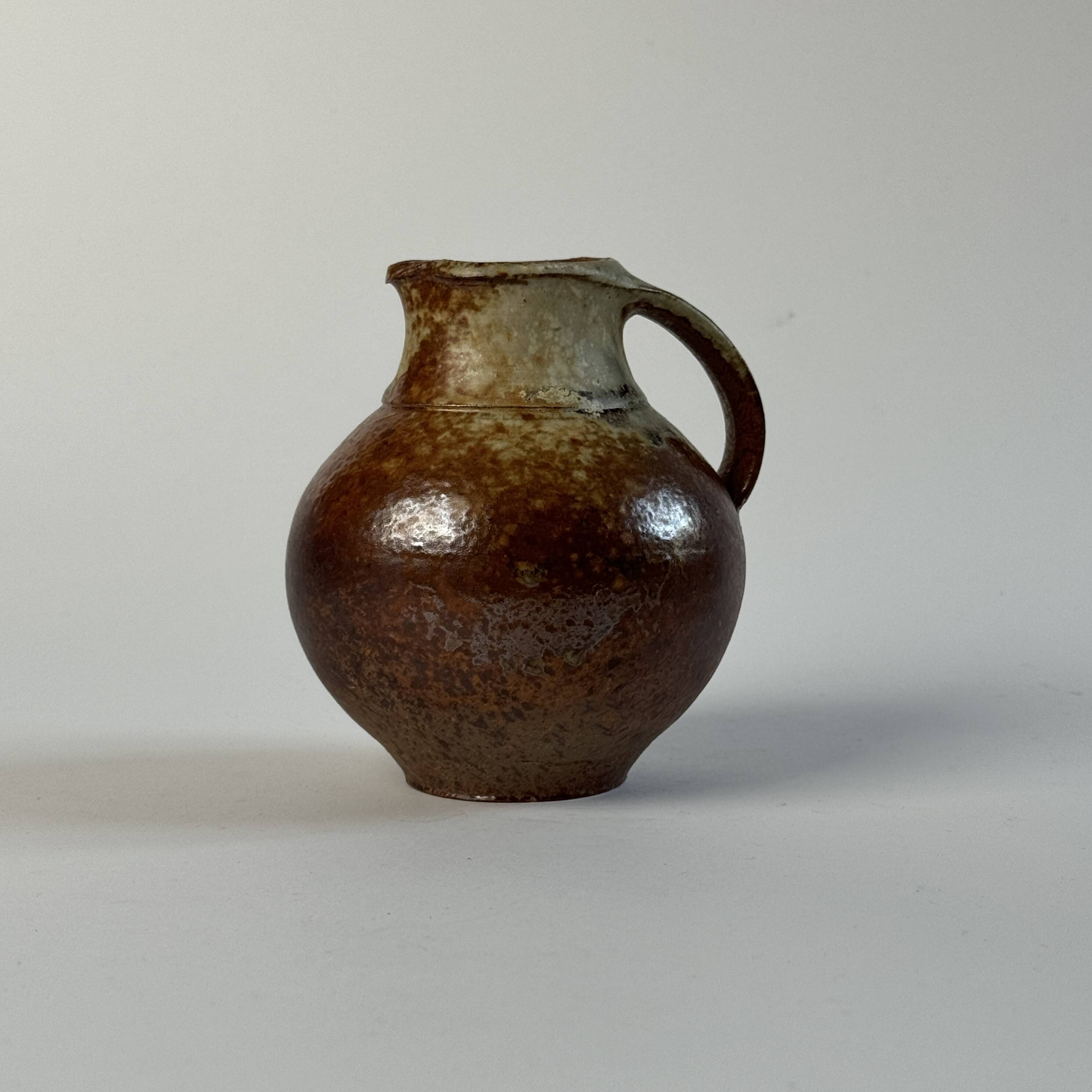 Pair of small Jacky Coville stoneware pitchers, 1970