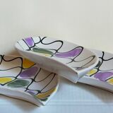 Three vintage free-form ceramic ravine dishes from the 1950s