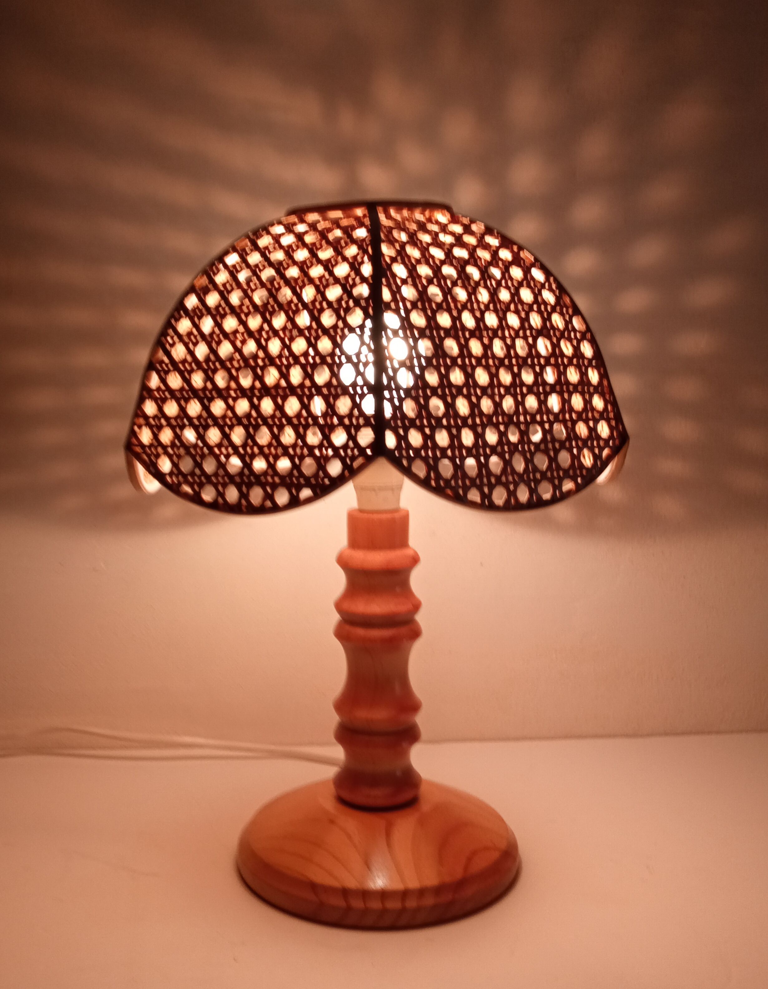 Wooden bedside lamp and cannage