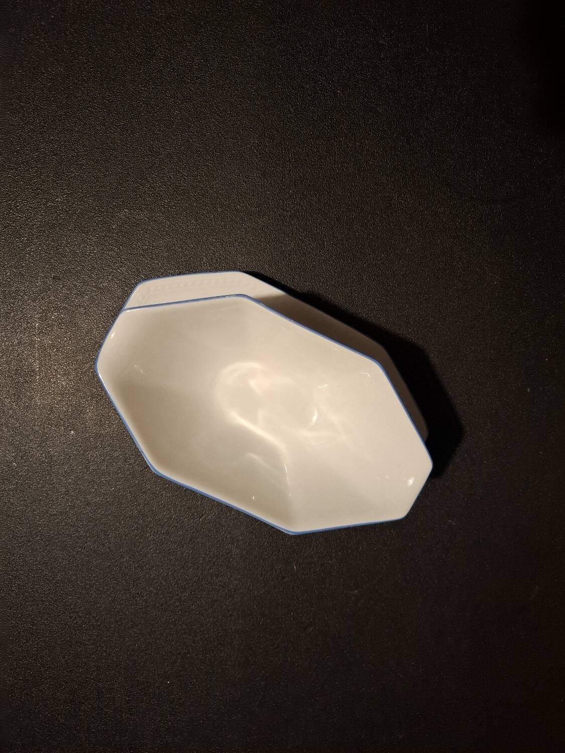 Dishes and porcelain sauceboat