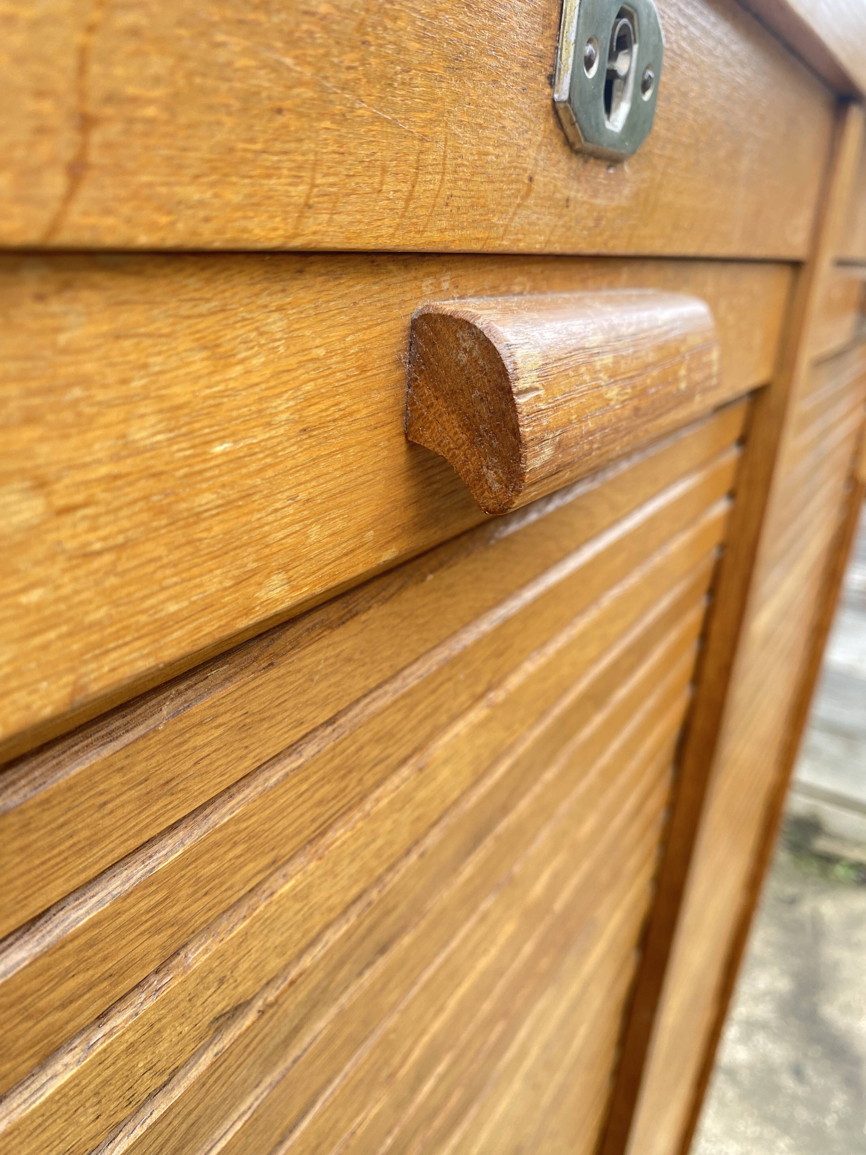 Double-column oak filing cabinet with curtains, 1950s.