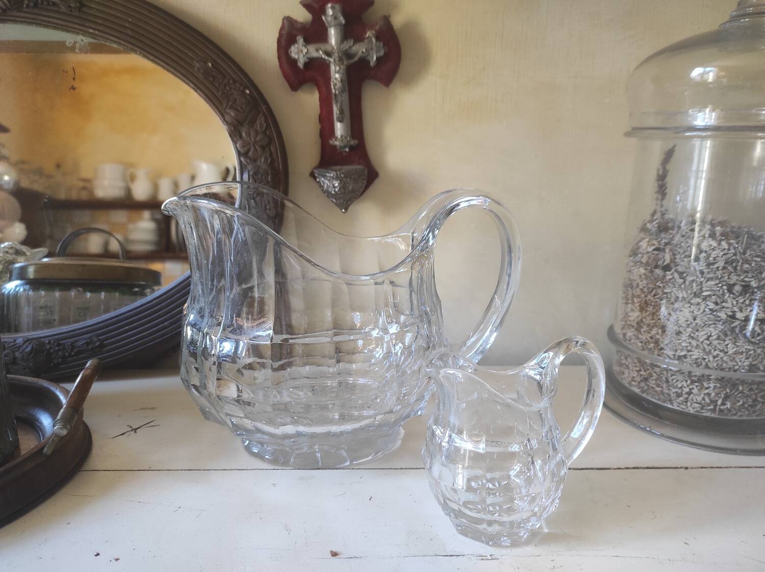 2 antique glass pitchers