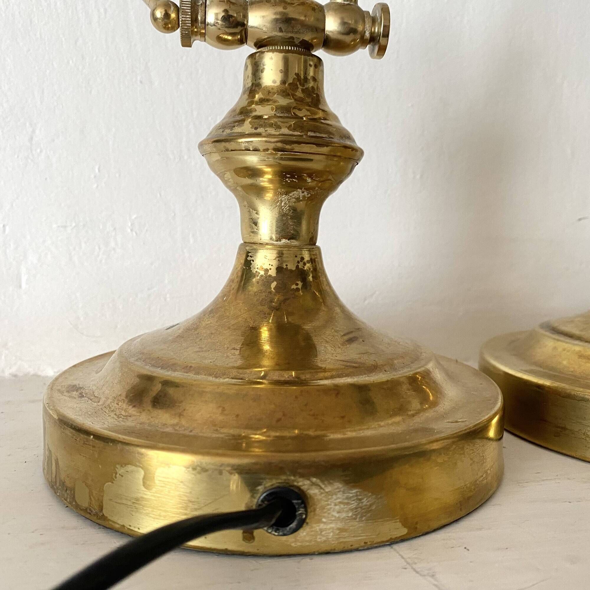 Pair of notary-style lamps in gilded metal