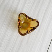 Thick amber yellow glass ashtray