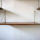 Modular wall shelves in exotic wood