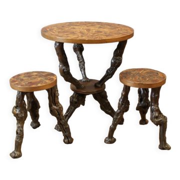 Pedestal table and its brutalist stools in vine stock around 1950