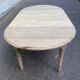 Round extendable dining table with flaps, stripped in raw oak, with 3 extensions.