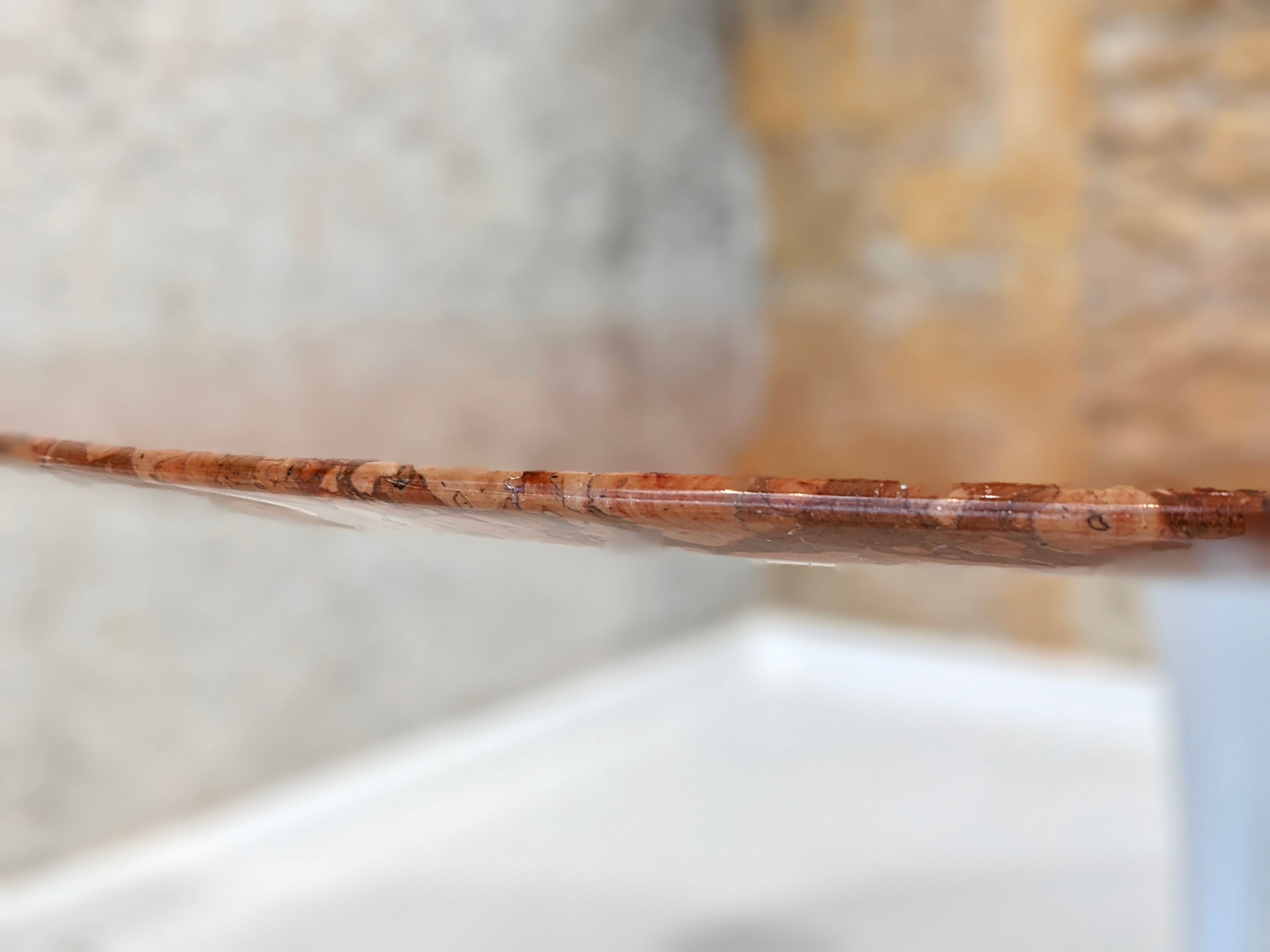 Round table in red marble by Eero Saarinen for Knoll