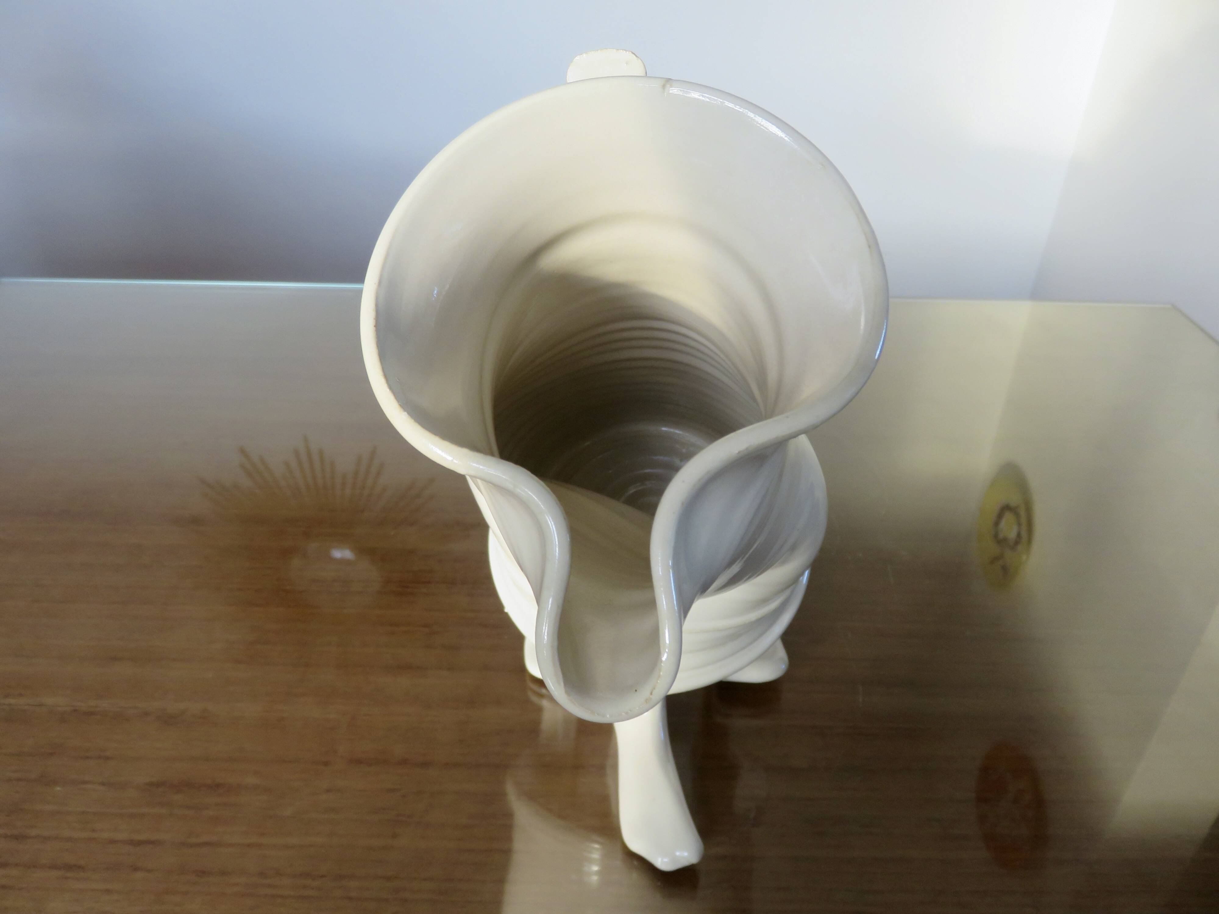 Anthropomorphic jug in slipware