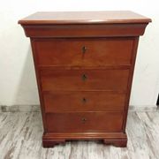 Wooden chest of drawers with a secret drawer