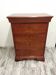 Wooden chest of drawers with a secret drawer