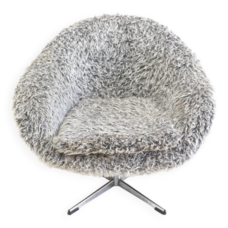 Grey swivel armchair with metal star base made in the 70s