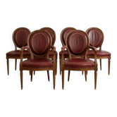 Set of 6 Louis XVI style medallion chairs and armchairs in burgundy leather.