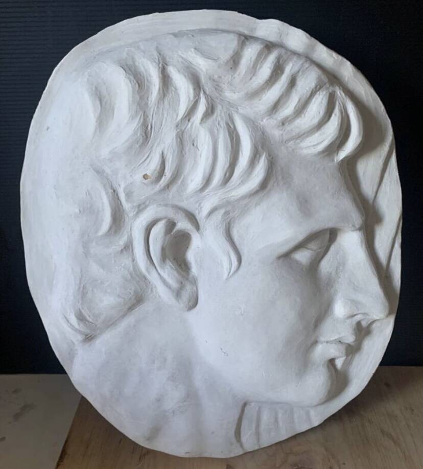 Bas relief plaster medallion