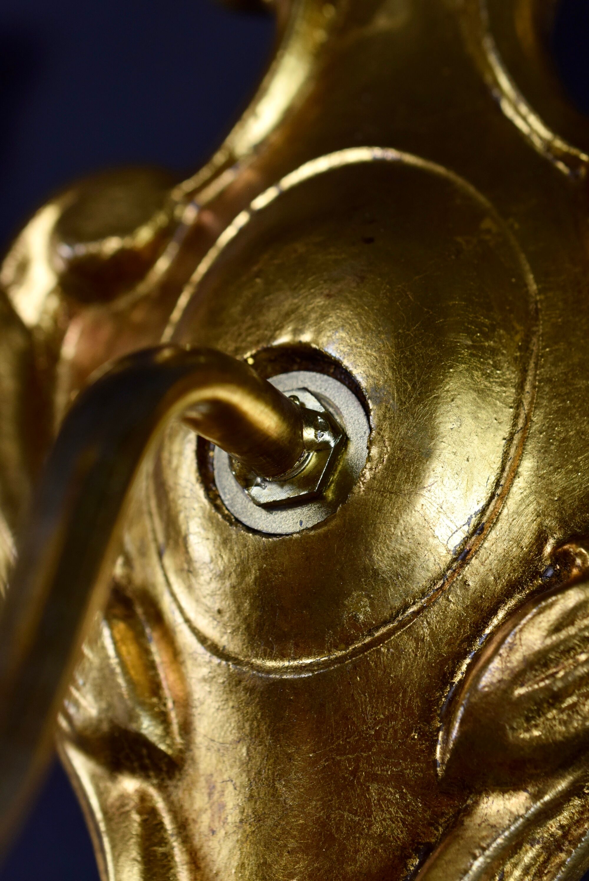 Pair of walled carved wood wall lamps