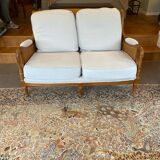 Sofa and armchair in cane and wood by Jean Roche