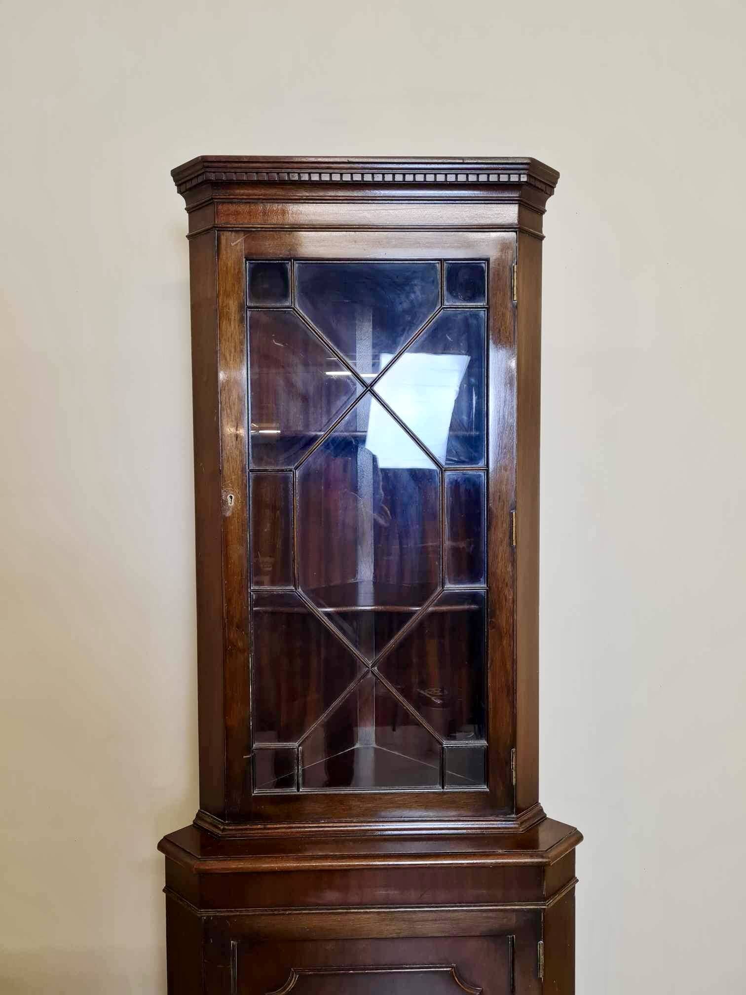 Pretty English mahogany corner bookcase
