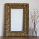 Gilded wooden and stucco frame