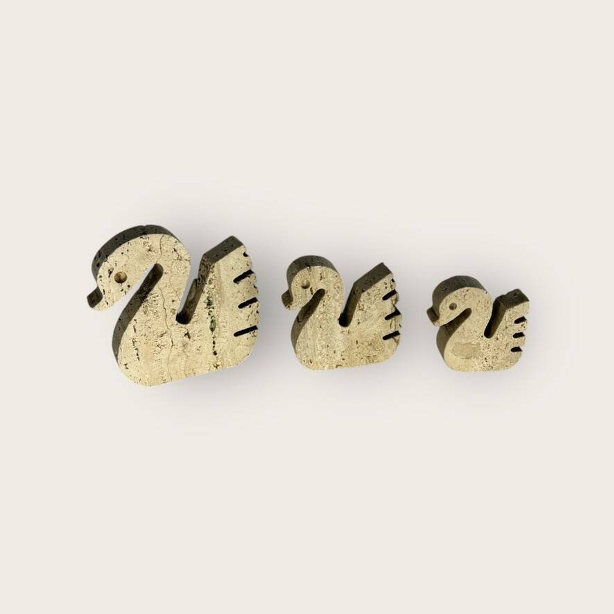 Swans Enzo Mari travertine for Fratelli Mannelli, Italy, 1970.