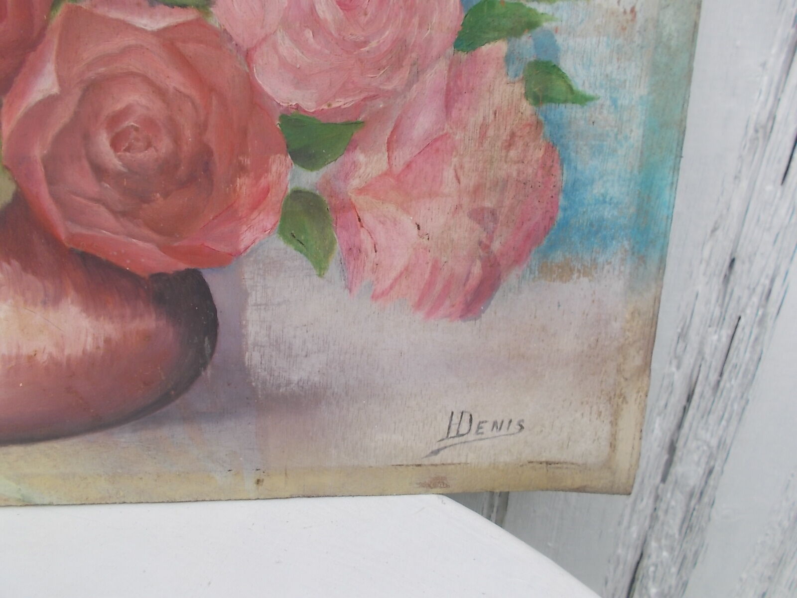 Tableau of a bouquet of flowers on a double-sided wooden panel.