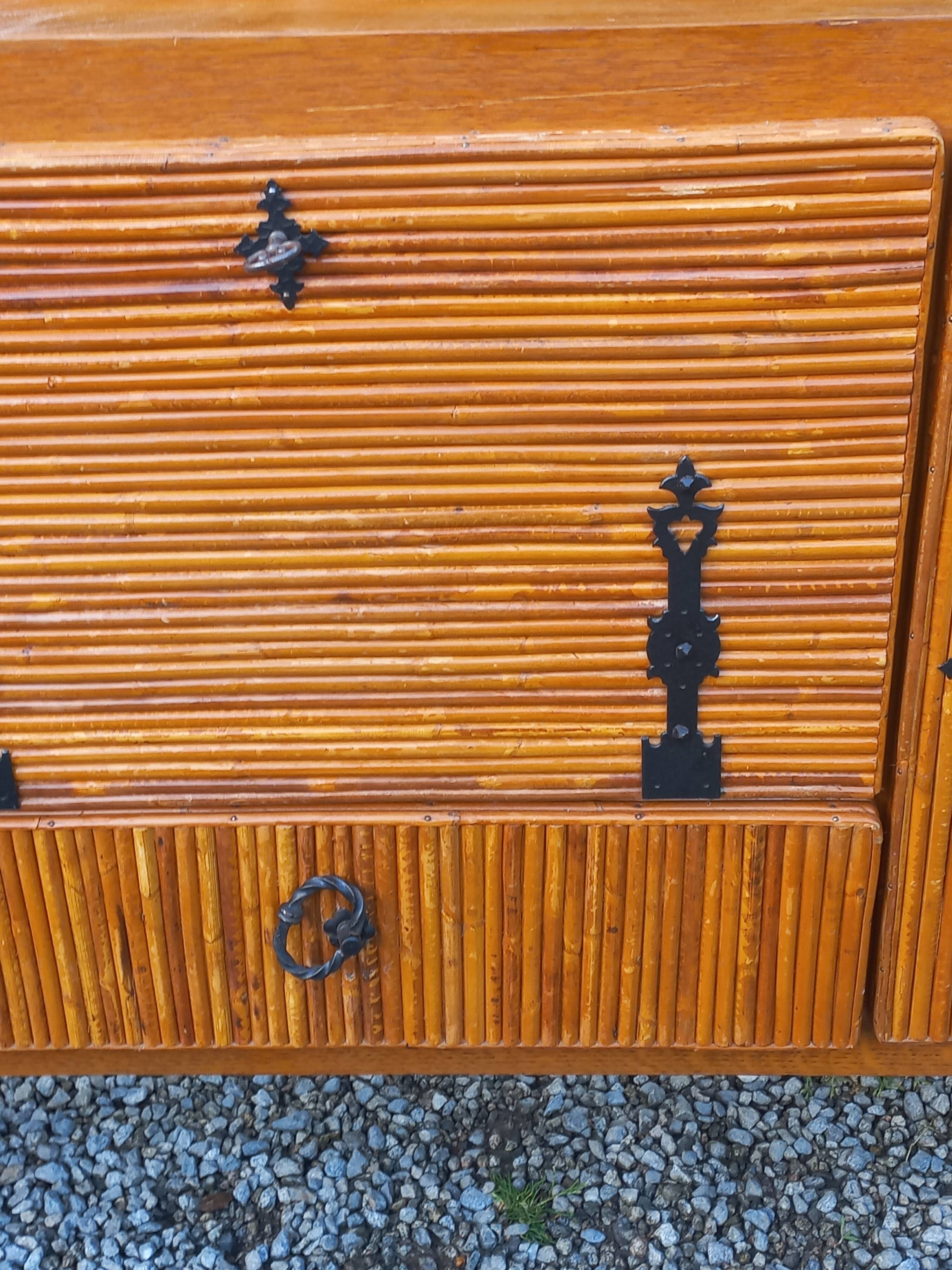 Bamboo and rattan enfilade attributed to Audoux and Minet.