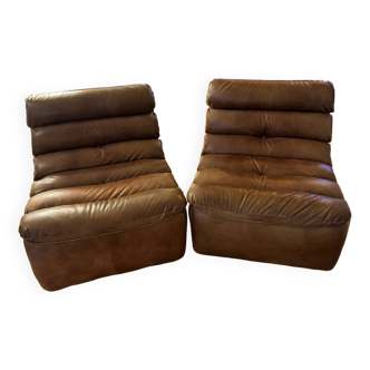 Pair of Flamant brand leather armchairs