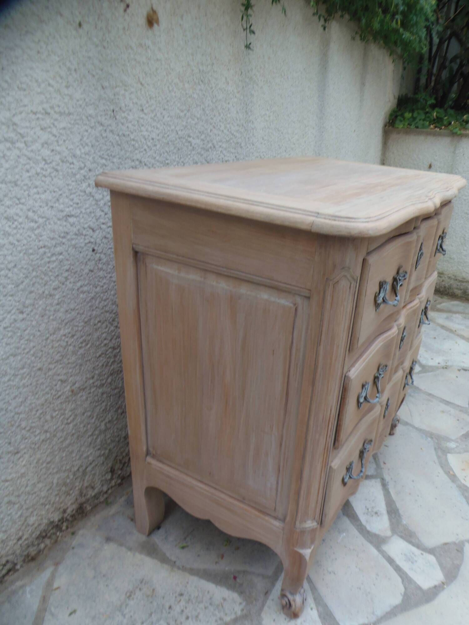 Beautifully crafted Louis XVI style commode in bleached wood.