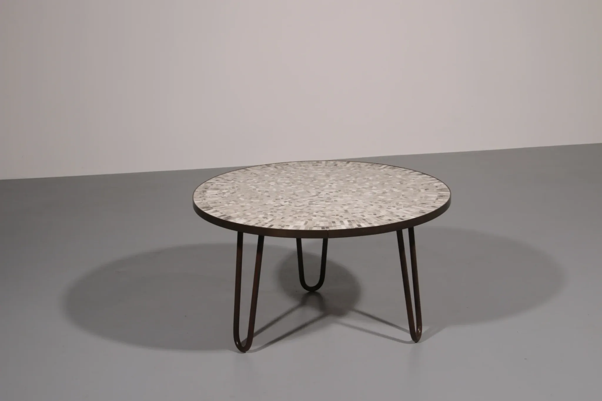 A stunning mosaic coffee table by German sculptor Berthold Müller